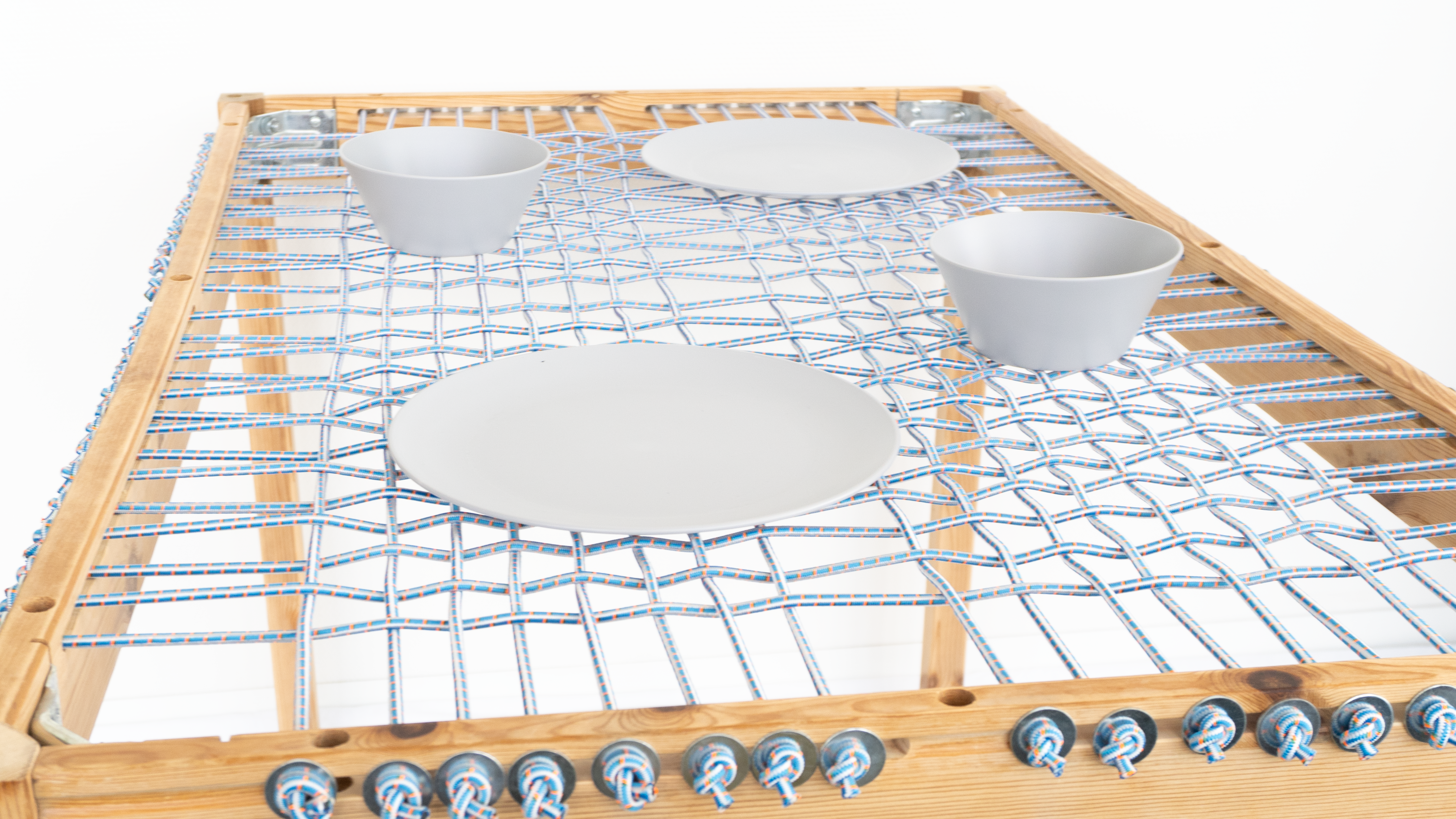 Angled view of the woven Surface Tension table